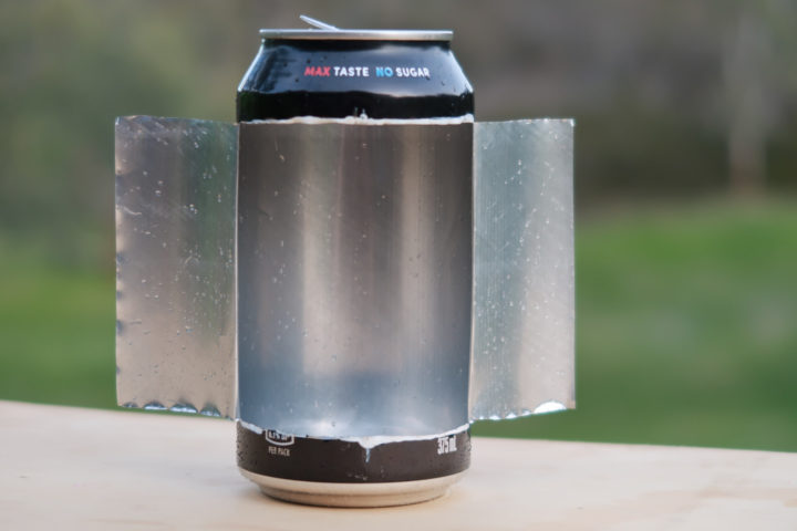 Pepsi Max aluminium can with a 2 door opening cut out and folded back behind can